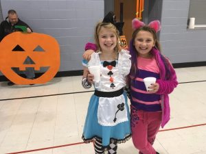 Two kids in halloween costumes